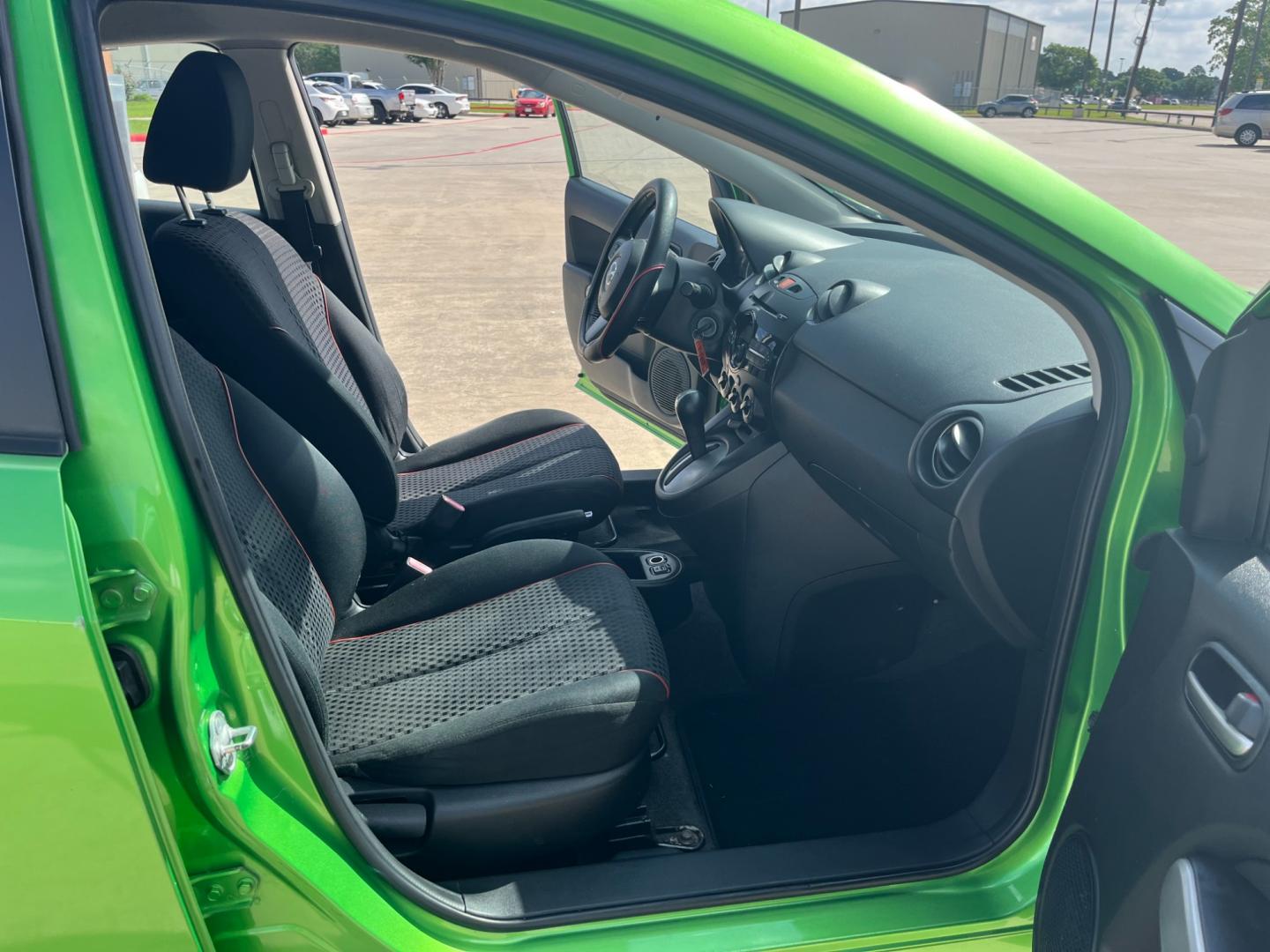 2013 green /black Mazda MAZDA2 Touring (JM1DE1LY1D0) with an 1.5L L4 DOHC 16V engine, Automatic transmission, located at 14700 Tomball Parkway 249, Houston, TX, 77086, (281) 444-2200, 29.928619, -95.504074 - Photo#11